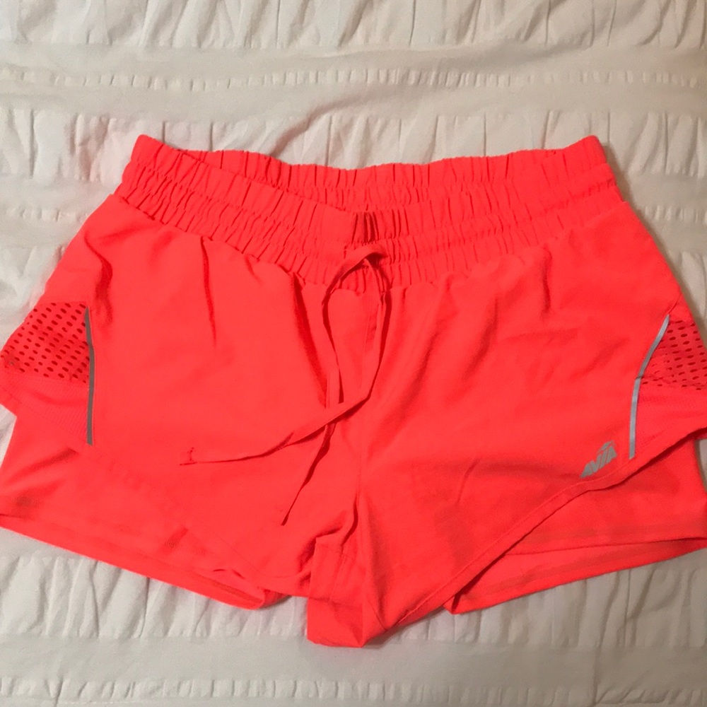 Neon orange workout shorts